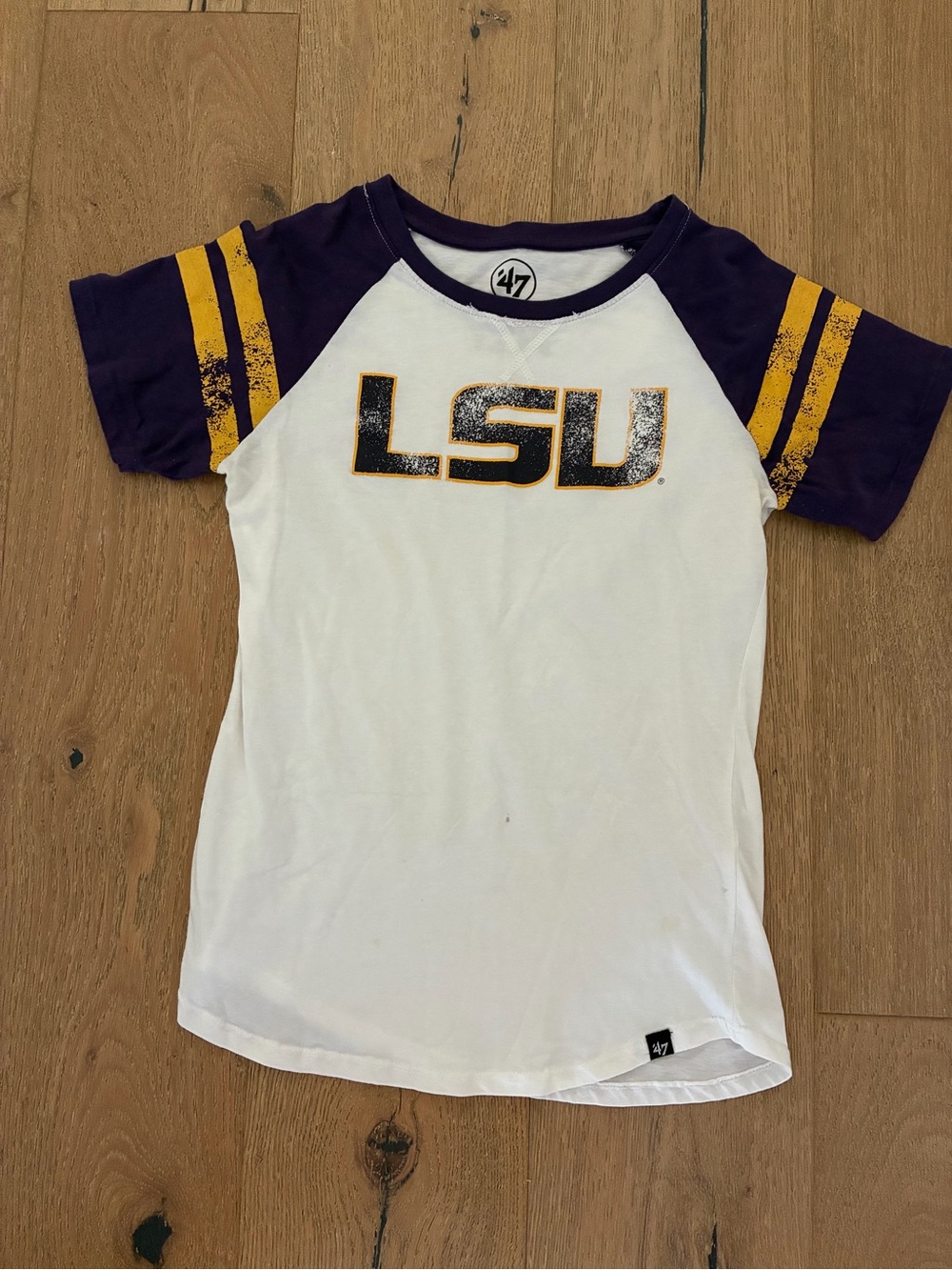 47 Youth LSU White Tee with Purple Sleeves and Gold Stripes